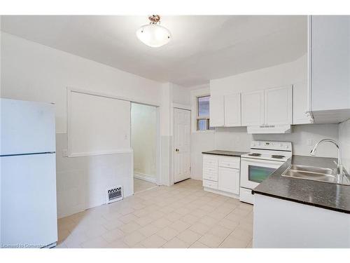 94 Wentworth Street N, Hamilton, ON - Indoor Photo Showing Kitchen With Double Sink