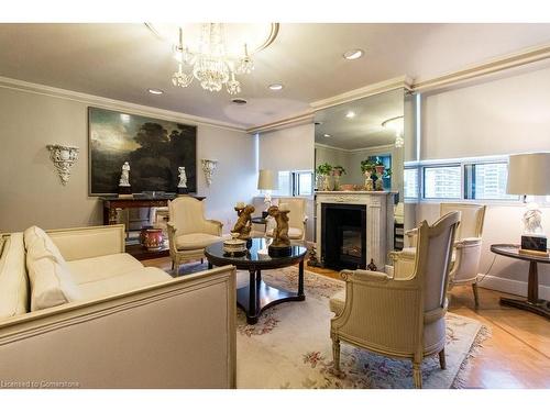 1602-120 Duke Street, Hamilton, ON - Indoor Photo Showing Living Room With Fireplace