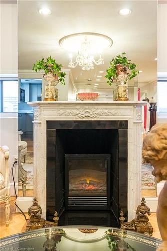 1602-120 Duke Street, Hamilton, ON - Indoor Photo Showing Living Room With Fireplace