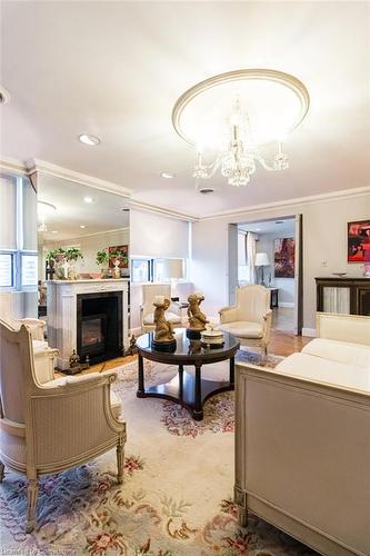 1602-120 Duke Street, Hamilton, ON - Indoor Photo Showing Living Room With Fireplace