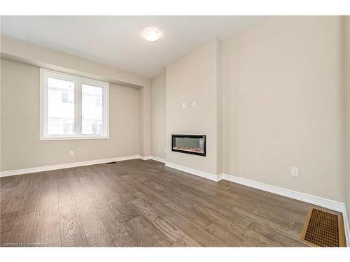 24 Jellicoe Court, Hamilton, ON - Indoor Photo Showing Other Room With Fireplace