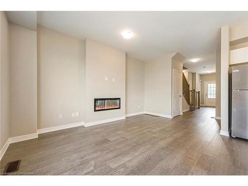 24 Jellicoe Court, Hamilton, ON - Indoor With Fireplace