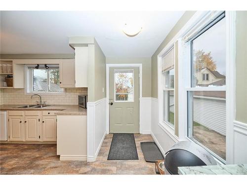 108 Cross Street E, Dunnville, ON - Indoor Photo Showing Kitchen With Double Sink