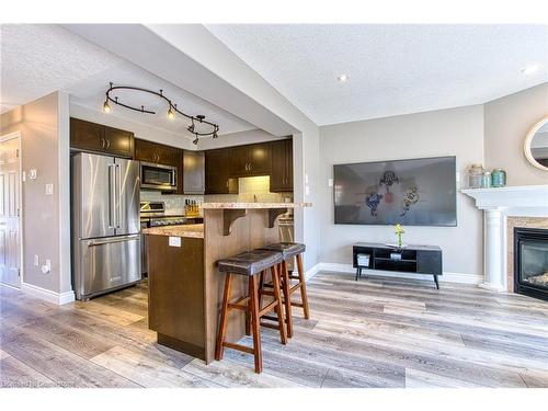 121 Sumner Crescent, Grimsby, ON - Indoor Photo Showing Kitchen With Fireplace