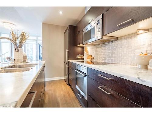 2206-90 Park Lawn Road, Etobicoke, ON - Indoor Photo Showing Kitchen With Double Sink With Upgraded Kitchen