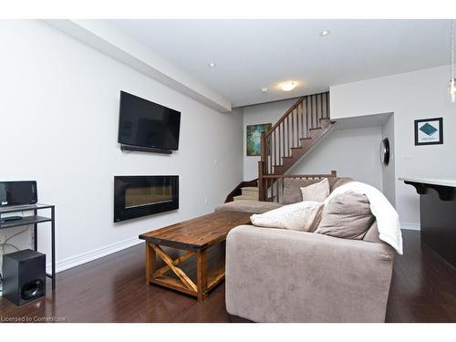 55-2086 Ghent Avenue, Burlington, ON - Indoor Photo Showing Living Room With Fireplace