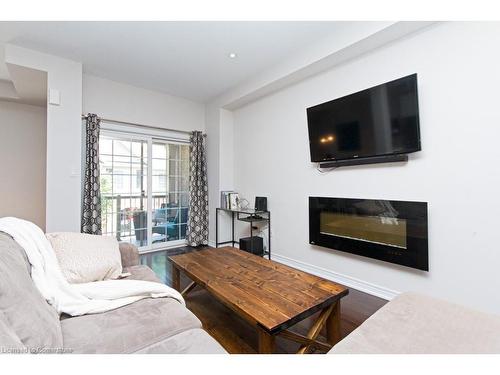 55-2086 Ghent Avenue, Burlington, ON - Indoor Photo Showing Living Room With Fireplace