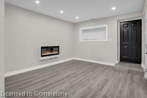 63 1/2 R Fullerton Avenue, Hamilton, ON - Indoor Photo Showing Other Room With Fireplace