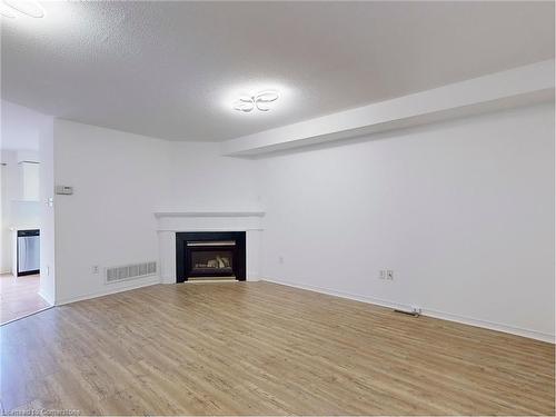 5109 Falconcrest Drive, Burlington, ON - Indoor Photo Showing Living Room With Fireplace