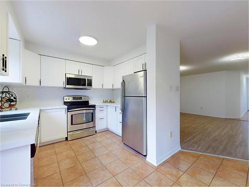 5109 Falconcrest Drive, Burlington, ON - Indoor Photo Showing Kitchen With Double Sink