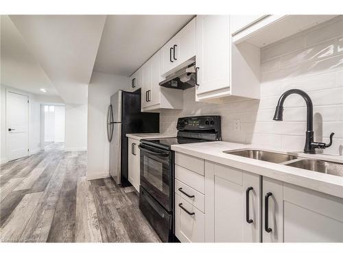 Lower-27 Grove Street, Hamilton, ON - Indoor Photo Showing Kitchen With Double Sink