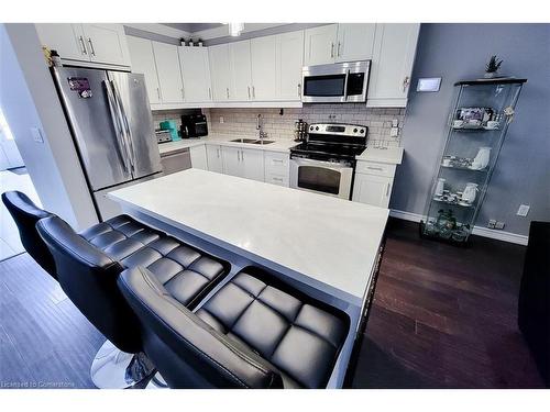 313 Fennell Avenue E, Hamilton, ON - Indoor Photo Showing Kitchen With Double Sink