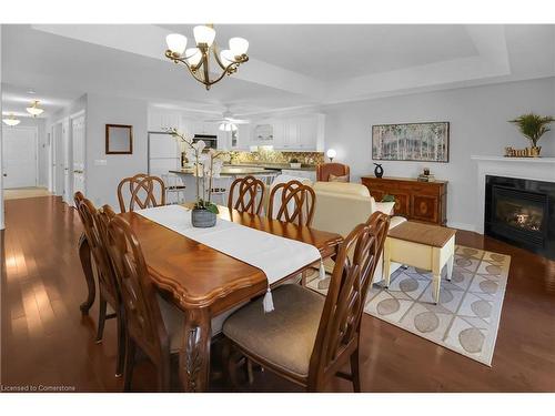 11-3730 Disher Street, Ridgeway, ON - Indoor Photo Showing Dining Room With Fireplace