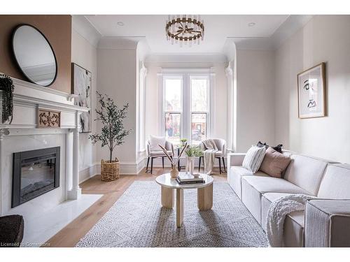 109 East Avenue S, Hamilton, ON - Indoor Photo Showing Living Room With Fireplace