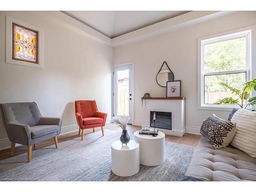 109 East Avenue S, Hamilton, ON - Indoor Photo Showing Living Room With Fireplace