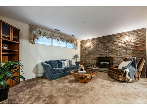 39 San Francisco Avenue, Hamilton, ON - Indoor Photo Showing Living Room With Fireplace