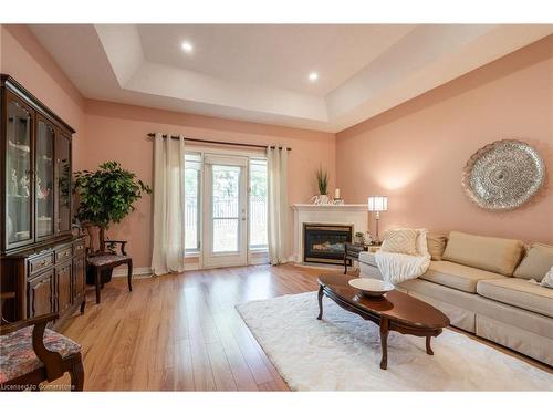 44 Greentrail Drive, Mount Hope, ON - Indoor Photo Showing Living Room With Fireplace