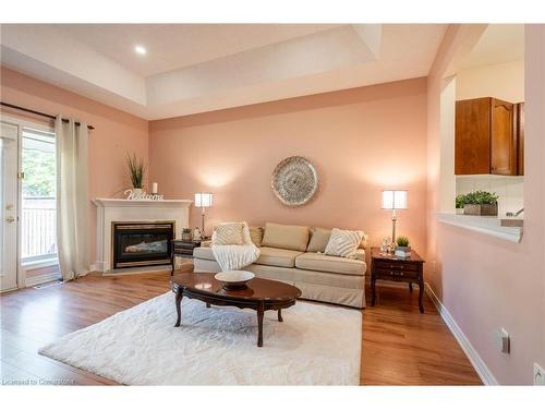 44 Greentrail Drive, Mount Hope, ON - Indoor Photo Showing Living Room With Fireplace