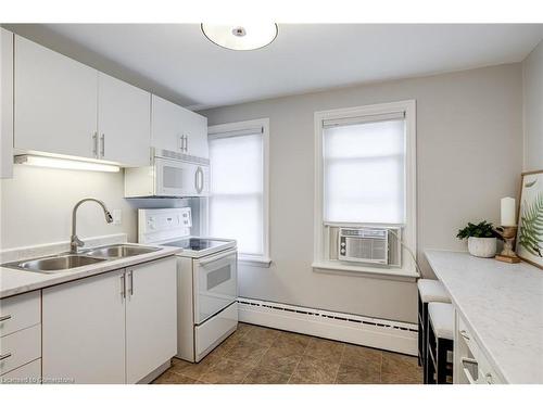 15 Empress Avenue, Hamilton, ON - Indoor Photo Showing Kitchen With Double Sink