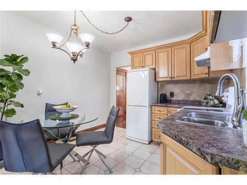 97 Strathearne Avenue, Hamilton, ON - Indoor Photo Showing Kitchen With Double Sink