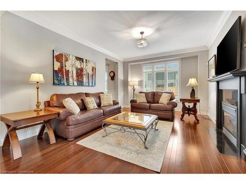 4070 Stadelbauer Drive, Beamsville, ON - Indoor Photo Showing Living Room With Fireplace