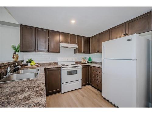 307-60 Lynnmore Street, Guelph, ON - Indoor Photo Showing Kitchen With Double Sink