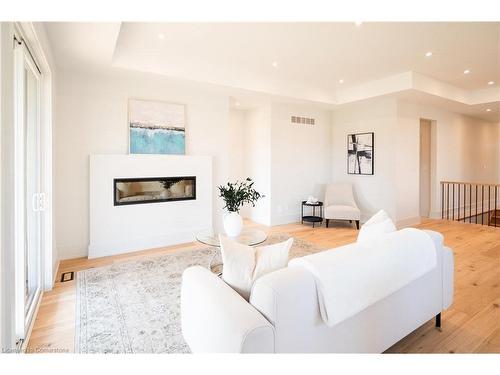 19 Oakley Drive, Niagara-On-The-Lake, ON - Indoor Photo Showing Living Room With Fireplace