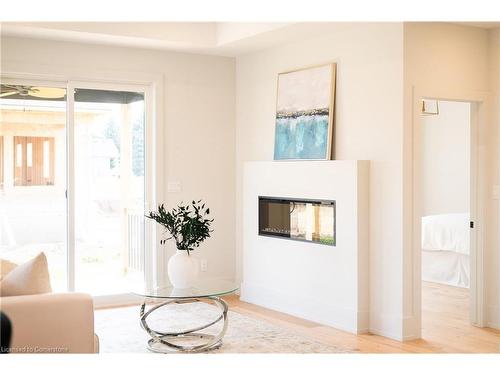 19 Oakley Drive, Niagara-On-The-Lake, ON - Indoor Photo Showing Living Room With Fireplace