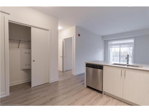 411-340 Plains Road E, Burlington, ON - Indoor Photo Showing Kitchen With Double Sink