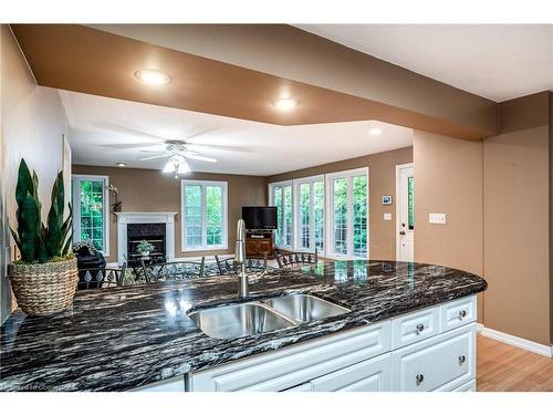 16 Durham Road, Stoney Creek, ON - Indoor Photo Showing Kitchen With Fireplace With Double Sink