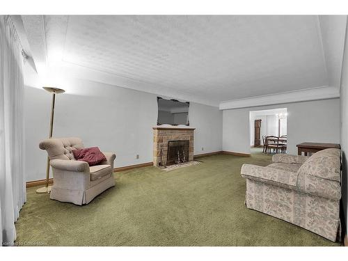 25 Sunning Hill Avenue, Hamilton, ON - Indoor Photo Showing Living Room With Fireplace