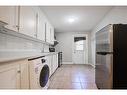 B-48 Locke Street S, Hamilton, ON  - Indoor Photo Showing Laundry Room 