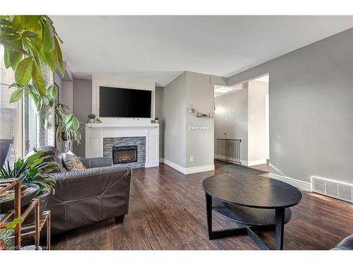 11 Rhodes Court, Hamilton, ON - Indoor Photo Showing Living Room With Fireplace