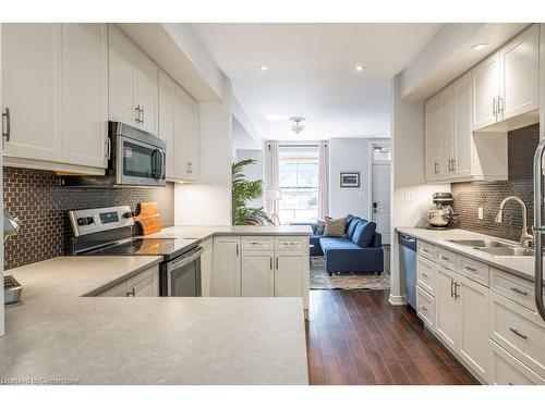 262 Jackson Street W, Hamilton, ON - Indoor Photo Showing Kitchen With Stainless Steel Kitchen With Double Sink With Upgraded Kitchen