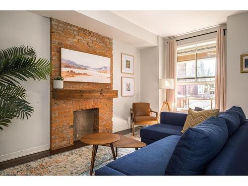 262 Jackson Street W, Hamilton, ON - Indoor Photo Showing Living Room With Fireplace