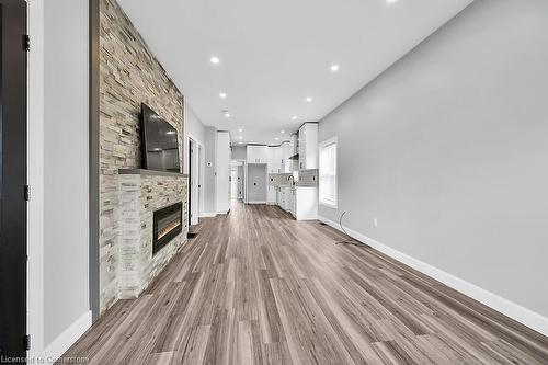 16 Webling Street, Brantford, ON - Indoor Photo Showing Other Room With Fireplace