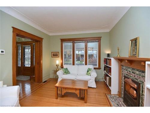 35 Gage Avenue S, Hamilton, ON - Indoor Photo Showing Living Room With Fireplace