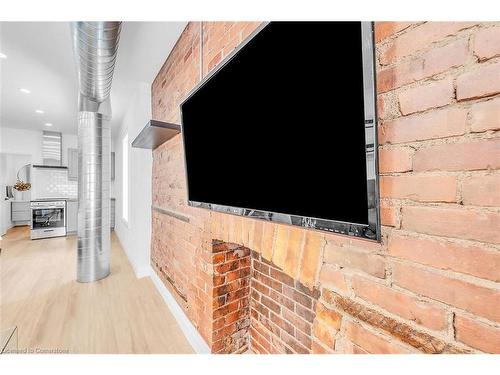 1 (Main)-198 Dundurn Street S, Hamilton, ON - Indoor Photo Showing Living Room With Fireplace