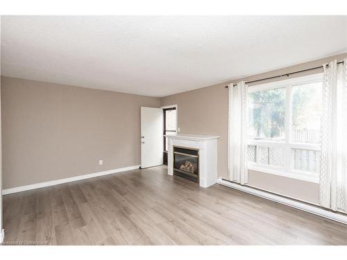 73 Fonthill Road, Hamilton, ON - Indoor Photo Showing Living Room With Fireplace