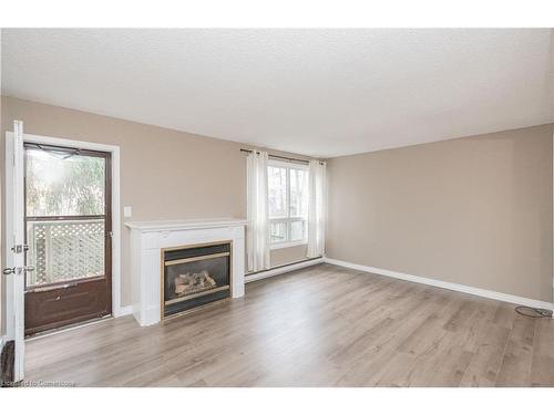 73 Fonthill Road, Hamilton, ON - Indoor Photo Showing Living Room With Fireplace