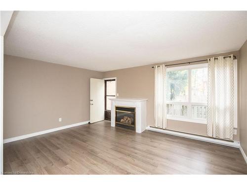 73 Fonthill Road, Hamilton, ON - Indoor Photo Showing Living Room With Fireplace