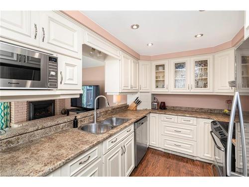 2-2052 Brant Street, Burlington, ON - Indoor Photo Showing Kitchen With Double Sink