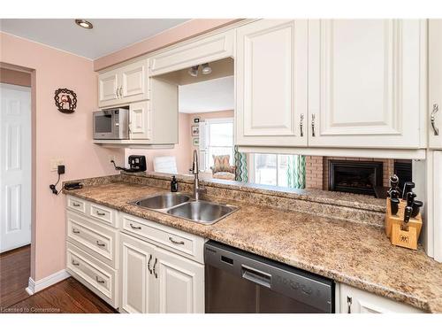 2-2052 Brant Street, Burlington, ON - Indoor Photo Showing Kitchen With Double Sink