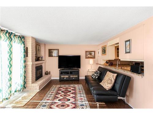 2-2052 Brant Street, Burlington, ON - Indoor Photo Showing Living Room With Fireplace