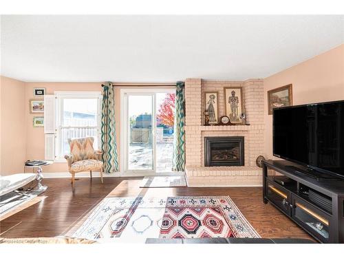 2-2052 Brant Street, Burlington, ON - Indoor Photo Showing Living Room With Fireplace