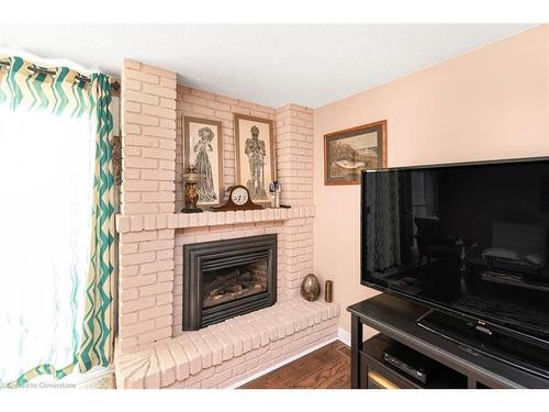 2-2052 Brant Street, Burlington, ON - Indoor Photo Showing Living Room With Fireplace