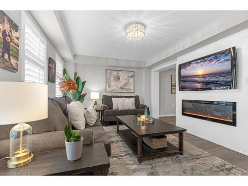 182 Binhaven Boulevard Boulevard, Binbrook, ON - Indoor Photo Showing Living Room With Fireplace