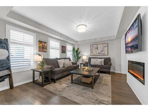 182 Binhaven Boulevard Boulevard, Binbrook, ON - Indoor Photo Showing Living Room With Fireplace