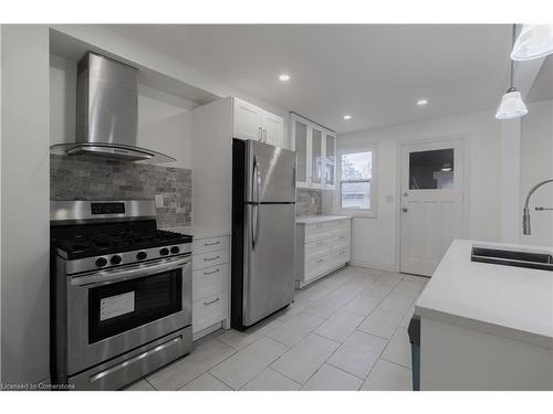 30 Graham Avenue N, Hamilton, ON - Indoor Photo Showing Kitchen With Double Sink