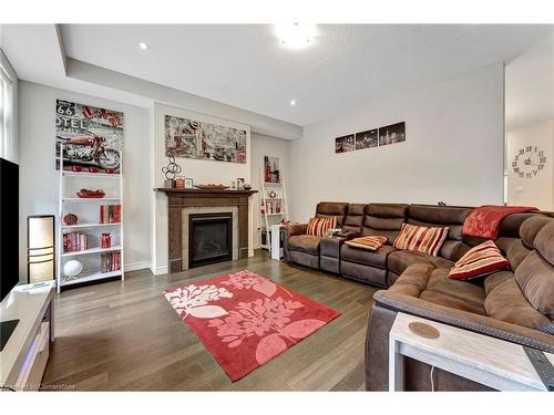 24 Strimble Street, Binbrook, ON - Indoor Photo Showing Living Room With Fireplace